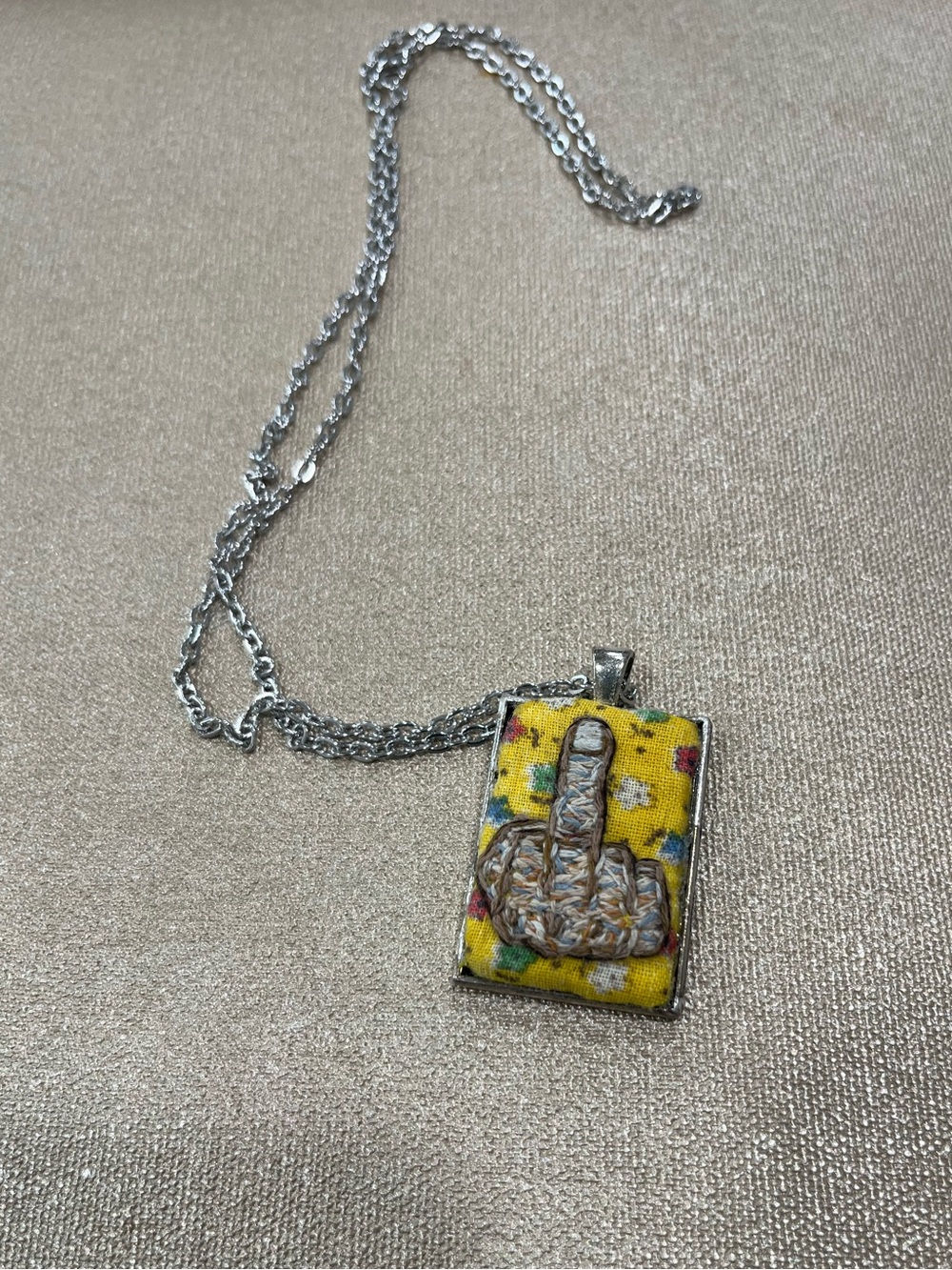 Middle finger hand embroidered pendant and necklace